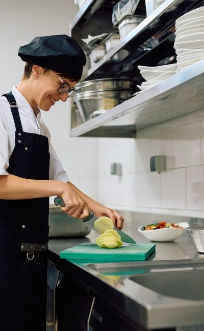 happy-female-chef-working-in-kitchen-in-a-restaurant-.jpg happy-female-chef-working-in-kitchen-in-a-restaurant-.jpg